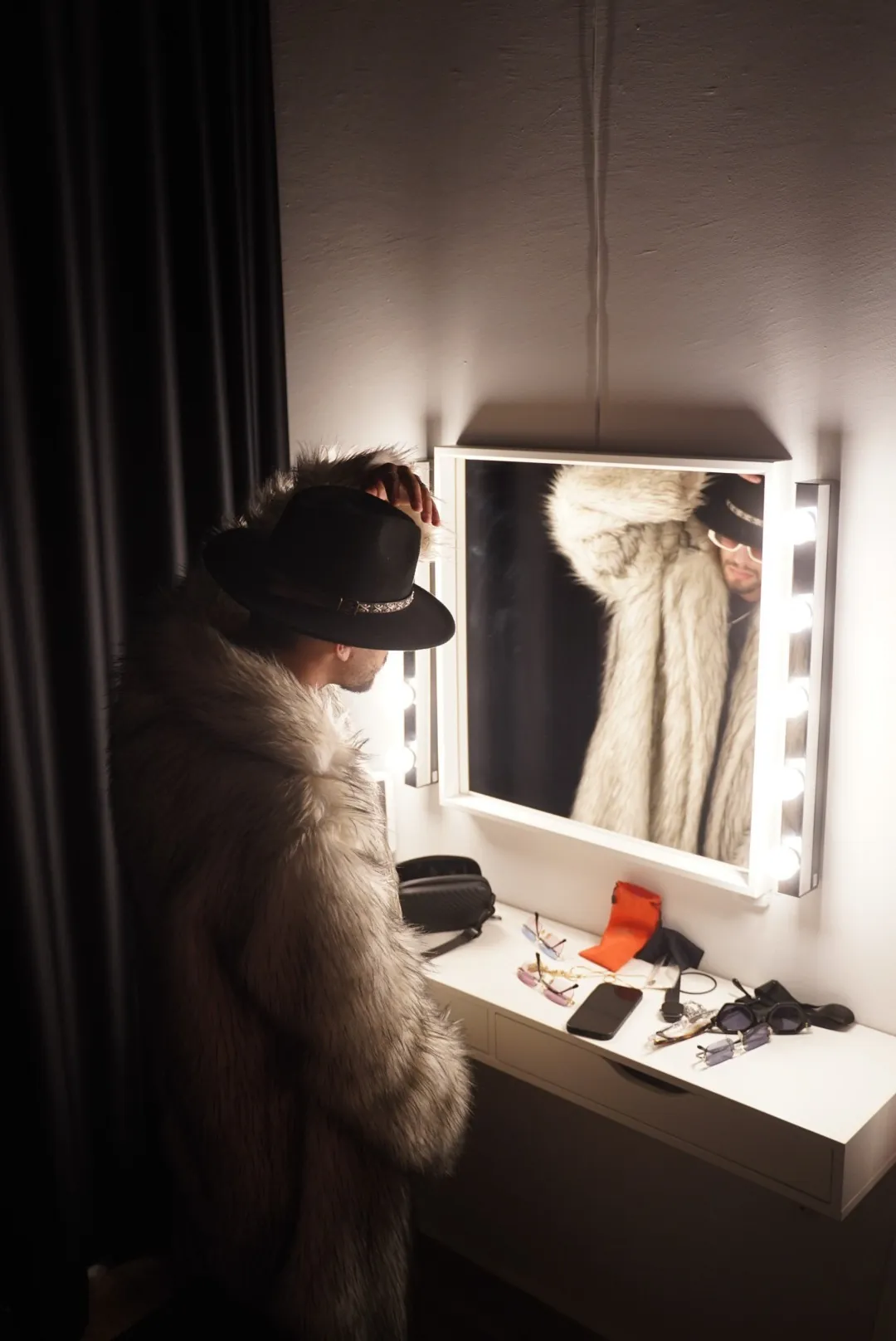ASHI backstage in front of a mirror